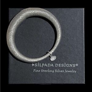 Retired Silpada sterling silver diamond cut spring coil bangle bracelet